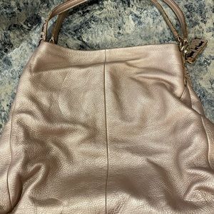 Rose gold authentic coach handbag